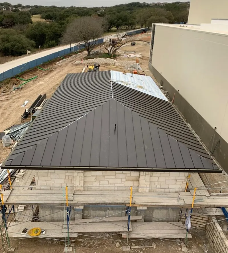 Metal roof new construction with scaffolding in Kingstowne